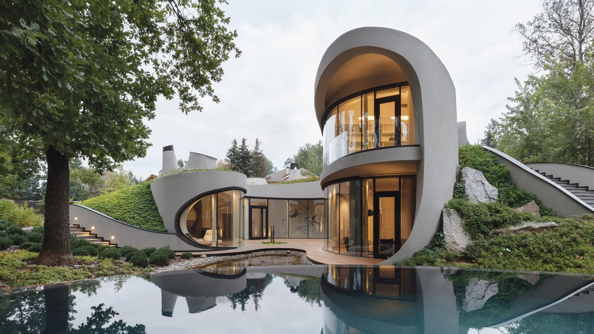 Una casa de arquitectura futurista sobre una colina